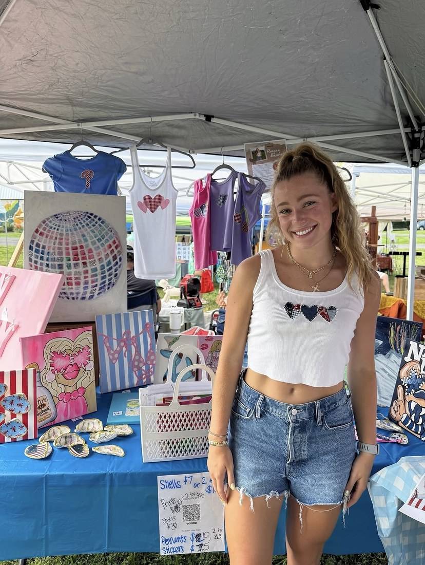 Reagan at her art festival booth