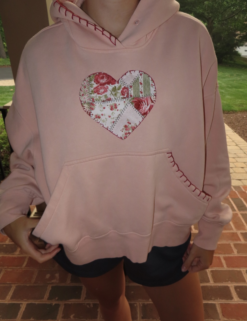 Pink hoodie with floral heart